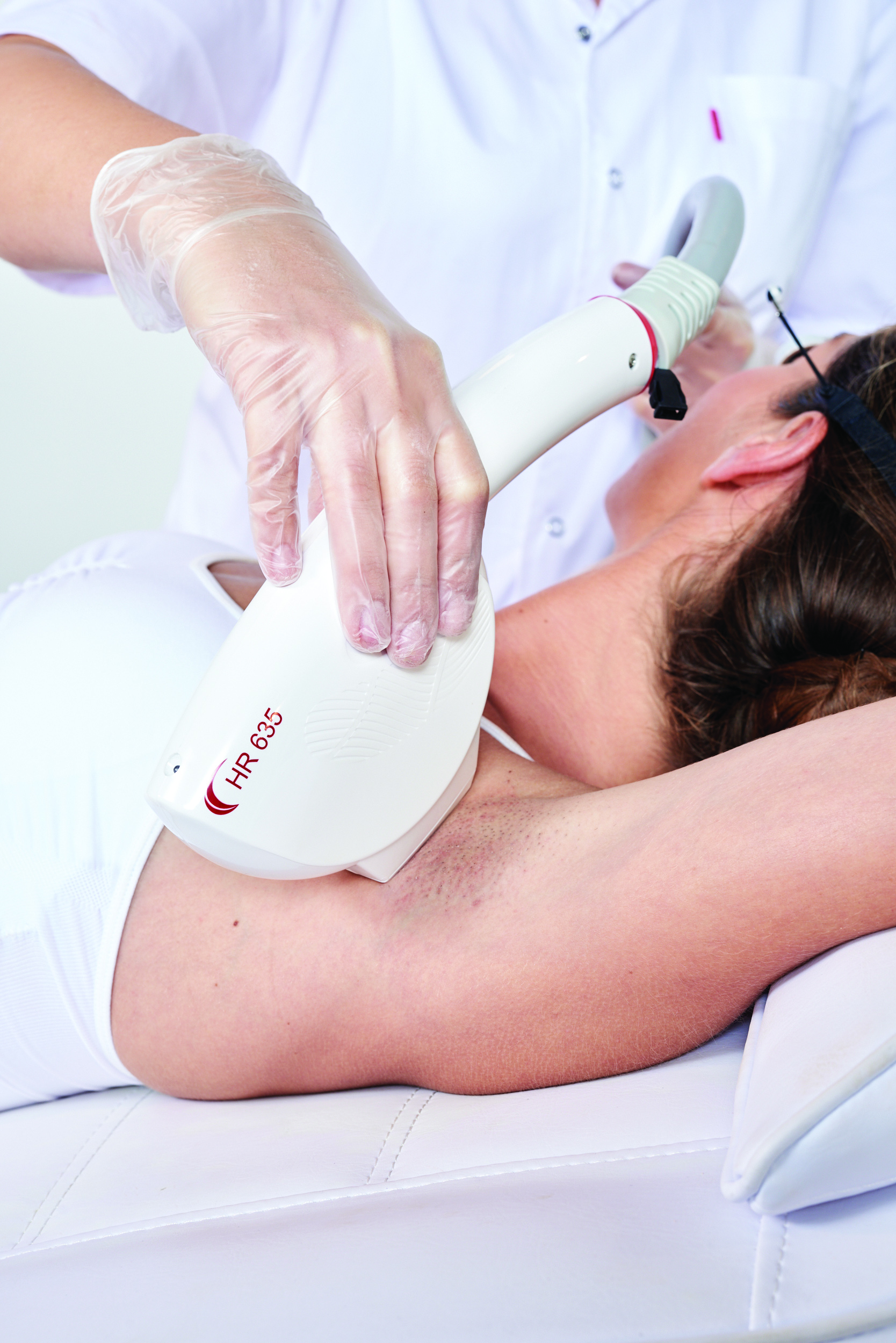 Image of a woman getting laser hair removal therapy